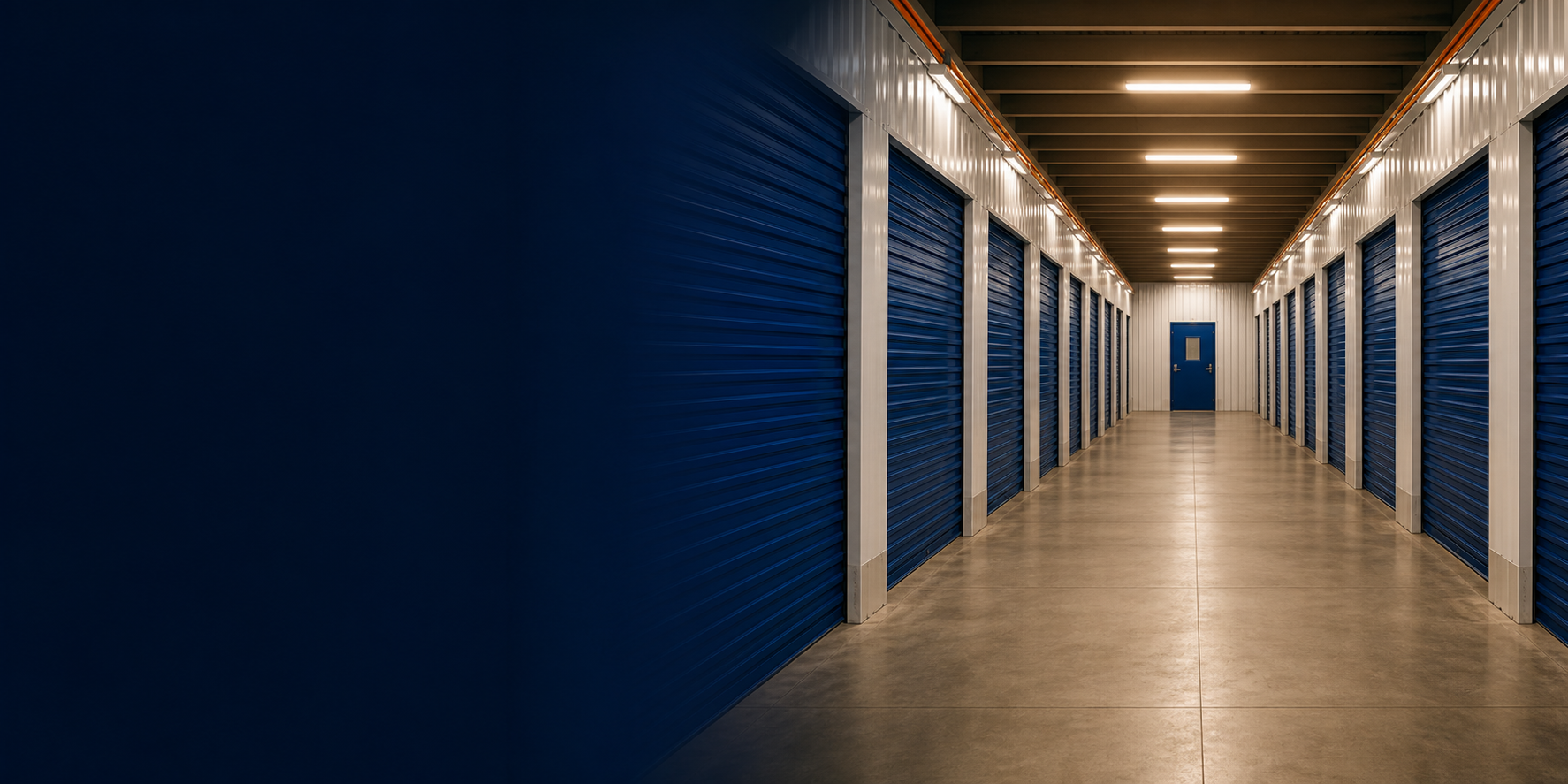 Interior self-storage hallway with blue roll-up doors